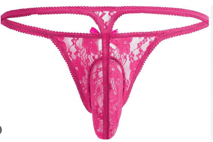 pink satin panties laid out on black lace