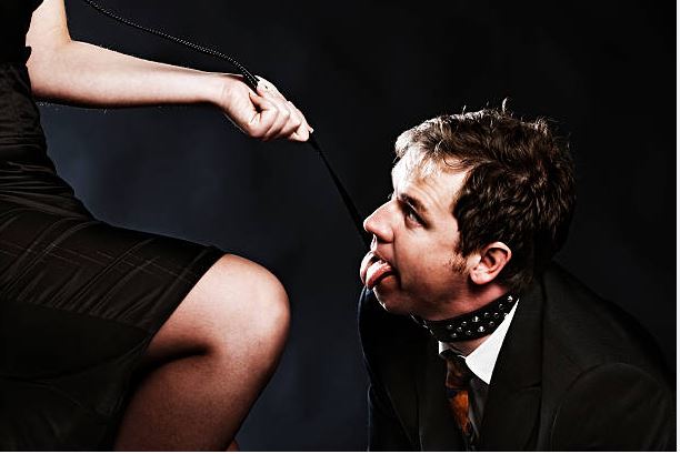 delicate pink lace panties laid out on black velvet